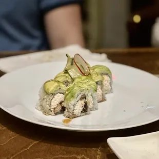 a plate of sushi on a table