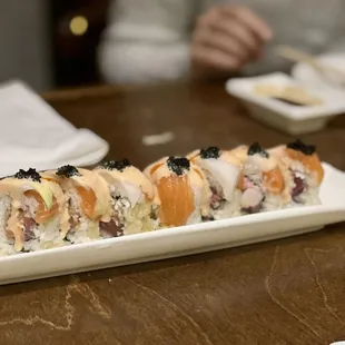 a plate of sushi on a table