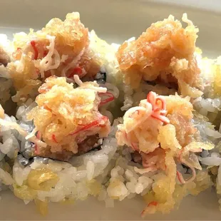 Chamblee Crunch Roll  Tuna, salmon, deep fried shrimp and crabmeat with tempura flakes