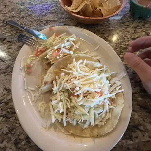 Papa, chicken, and desebrada taco. Papa taco in particular was surprisingly good.