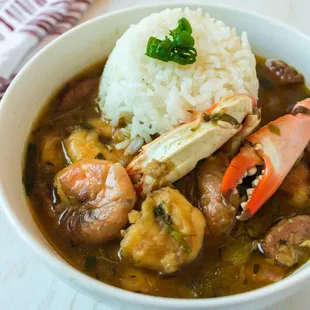a bowl of seafood and rice
