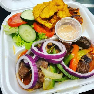 Niceness.

Traditionally prepared stew goat complete.

This order is always paired with rice.