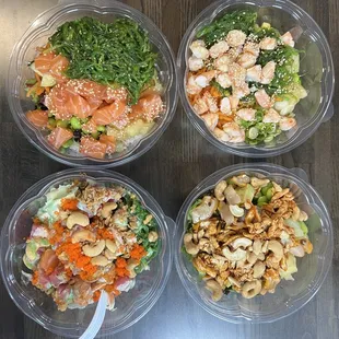 four bowls of food on a table