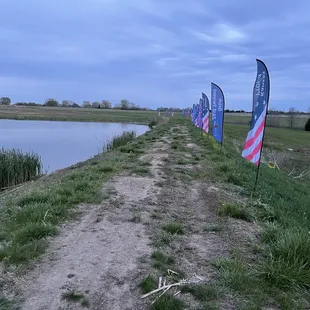 Flags on the dam of the lake