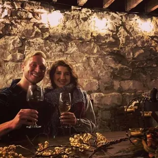 These guests are enjoying our Secret Cellar! Where the wine-making happens!