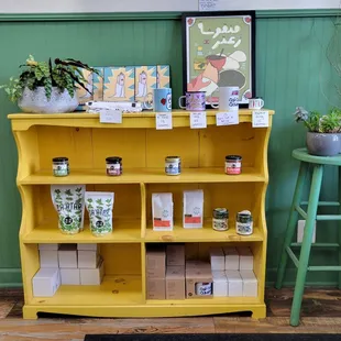 Mugs, spices, and Dead Sea salt for sale.