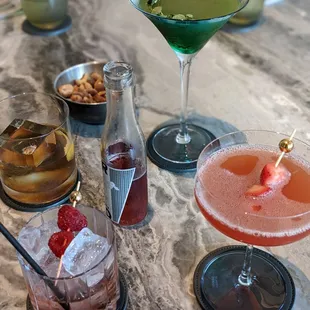 a variety of cocktails on a table