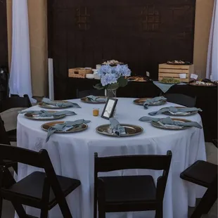 They handled table settings with charger, napkin, and printed menu