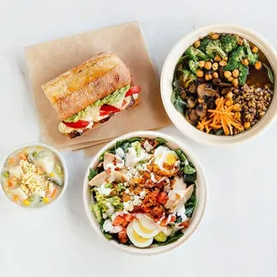 a bowl of salad and a sandwich