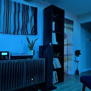 a living room with blue lighting