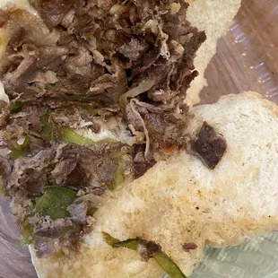 Half of a sad Philly Cheesesteak