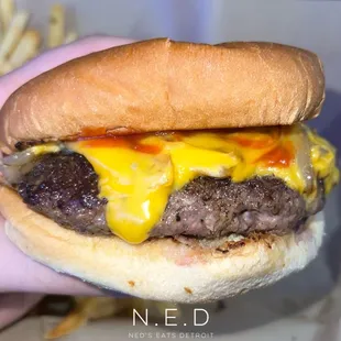7oz Cheeseburger with Sautéed Onions