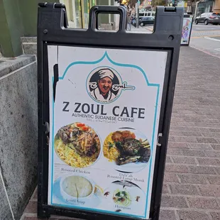 a sign on the sidewalk
