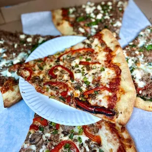 several slices of pizza in a box