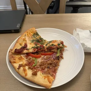 Sausage peppers and onion pizza