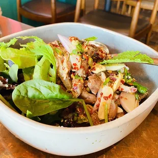 a salad in a bowl on a table