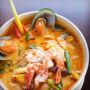 Tsunami: Mix Seafood Soup/ Jumbo Shrimp/ Scallop/Squid/Mussel in Creamy Tomyum Soup Thai Style