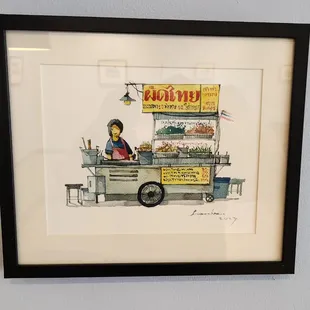 a man selling food from a cart
