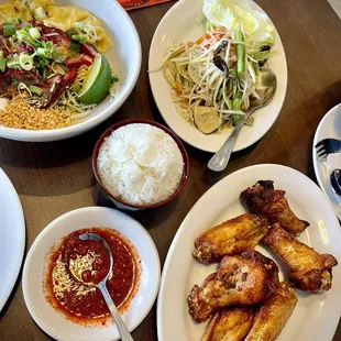 Fried chicken, sticky rice, Zaab style papaya salad, wonton bbq pork noodles (dry)