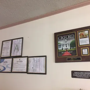 a picture of a wall with a picture of the restaurant