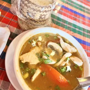 Tom yum soup with chicken , side of sticky rice (have to pay extra)