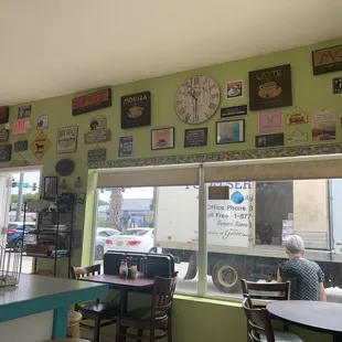 a man sitting at a table in a restaurant