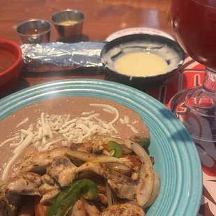 Chicken fajita and refried beans (both bland and lack taste)