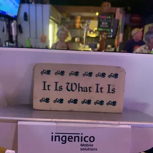 Local dive bar, no smoking inside. Karaoke on Saturday night.