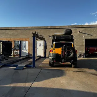 Front of Zack&apos;s Garage Tucson; vintage FJ with replaced engine!