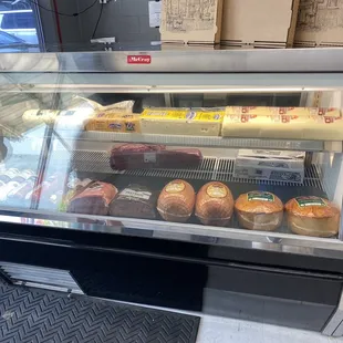 Meats and cheeses ready to be sliced