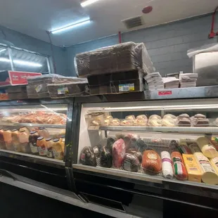a deli case filled with food