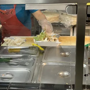 Freshly made right on the spot. They even fry tortillas for nachos on an individual basis same with the fries...