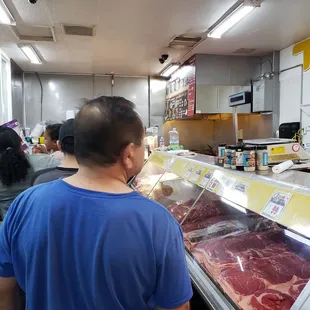 lines move a lot faster than they look. you order and pick up your food, then pay for it at one of 2 of the store's main cashiers