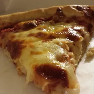A slice of heavenly cheese pizza.