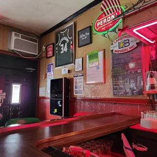 a bar with a neon sign