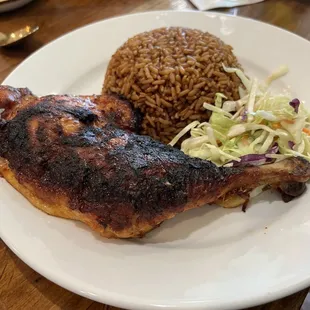 Charcoal chicken with Jollof rice