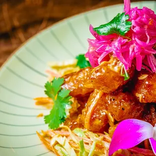 a plate of asian food