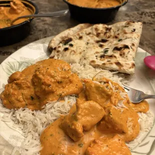 Chicken Tikka and Butter Chicken with rice and Garlic Naan