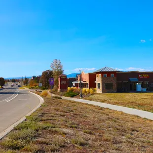 a view of a road and a building