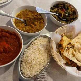 34. Baigan Bartha, 33. Masala Bhind, 43. Chicken Vindaloo, Plain Naan, Potato Naan