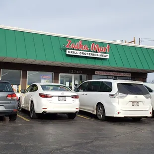 cars parked in front of the store