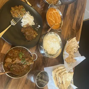 Goat Masala, Baighan Batha, Butter chicken, breads and rice