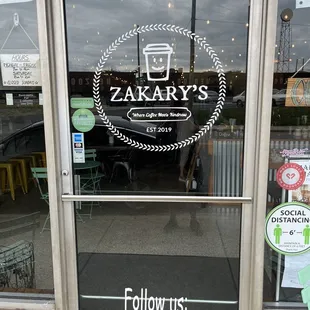 the entrance to a restaurant