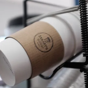 a coffee cup on a stand