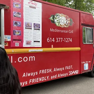 a food truck parked in a parking lot