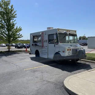 a food truck parked in a parking lot