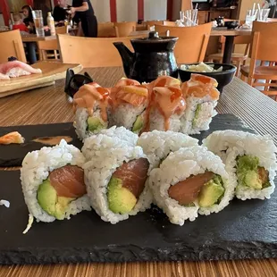 Salmon &amp; Avocado Lincoln Roll Hamachi hiding in the background