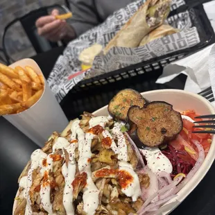 Chicken bowl, steak Saj, fries