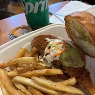 Mild Chicken Sandwich Combo with sauce in the side.