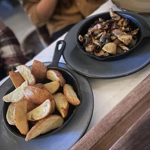 Side of Potato Wedges and Guajillo garlic sautéed mushrooms ($10)